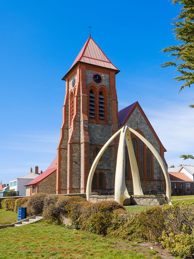 Church with Whalebone Arch, Stanley, the capital of the Falkland Islands. East Falkland. art print by Martin Zwick for $57.95 CAD