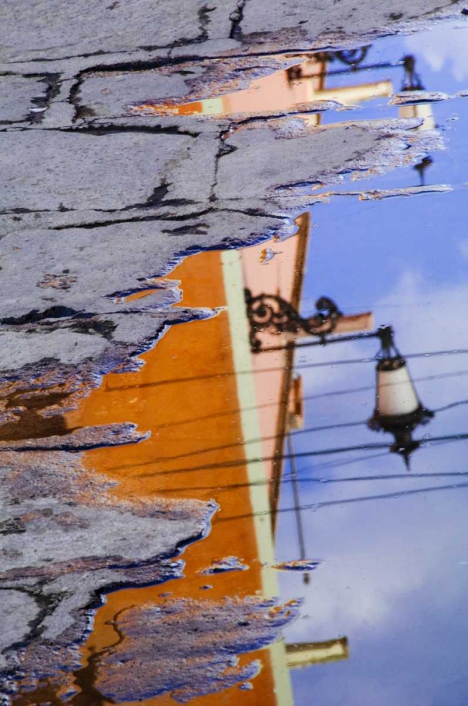 Mexico, Lantern reflection in puddle art print by Nancy Rotenberg for $57.95 CAD