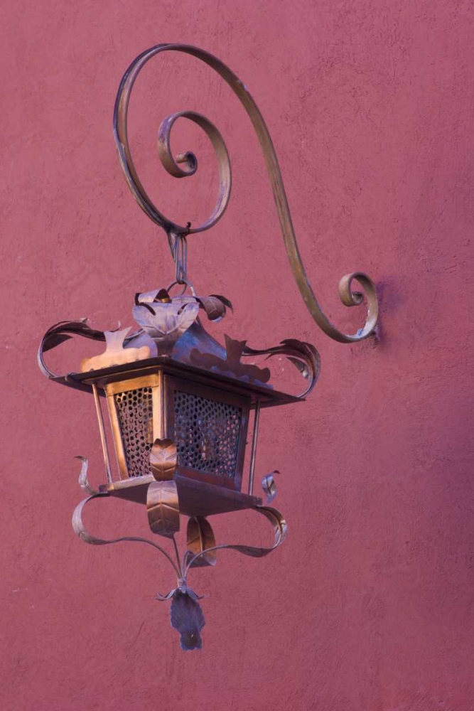 Mexico Copper lamp hung from pink-purple wall art print by Bill Young for $57.95 CAD