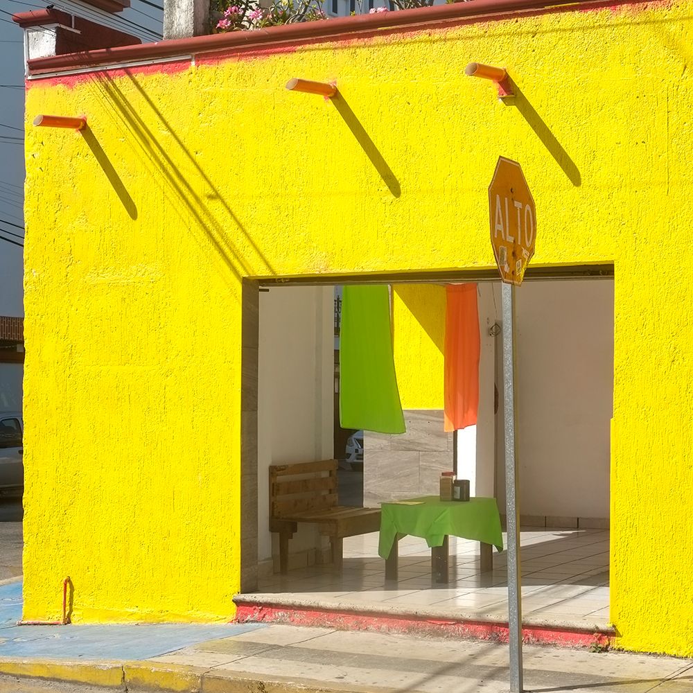 Playa del Carmen, Mexico. Bight yellow cafe on the street. art print by Julien McRoberts for $57.95 CAD