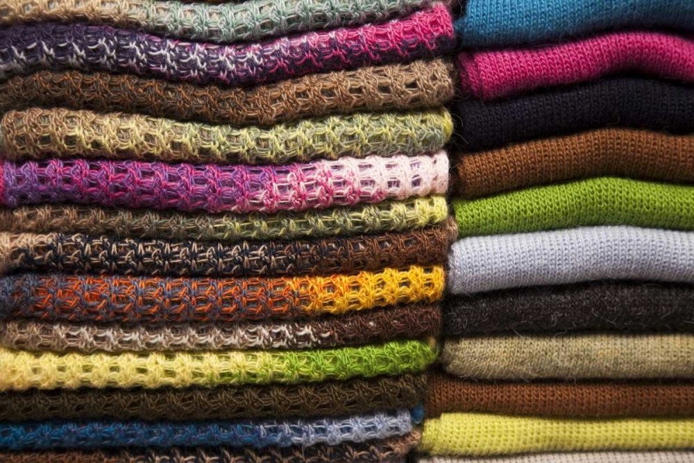 Peru, Aguas Calientes Stack of textile of wool art print by Wendy Kaveney for $57.95 CAD