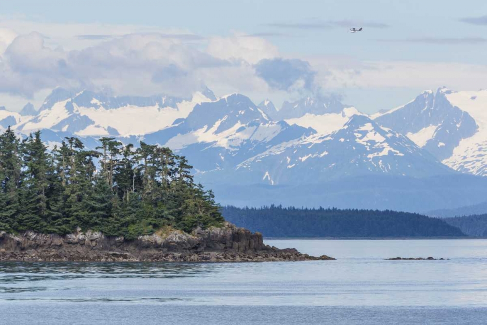 Alaska Air taxi flies over mountain landscape art print by Don Paulson for $57.95 CAD