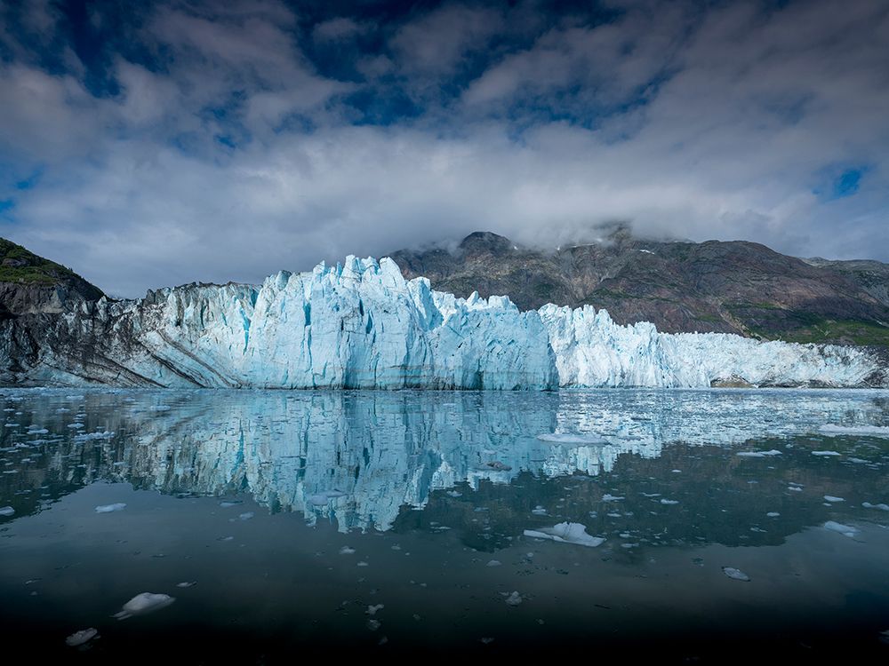 The waters of Tarr Inlet create a perfect reflection for the terminus of Margerie Glacier art print by Betty Sederquist for $57.95 CAD