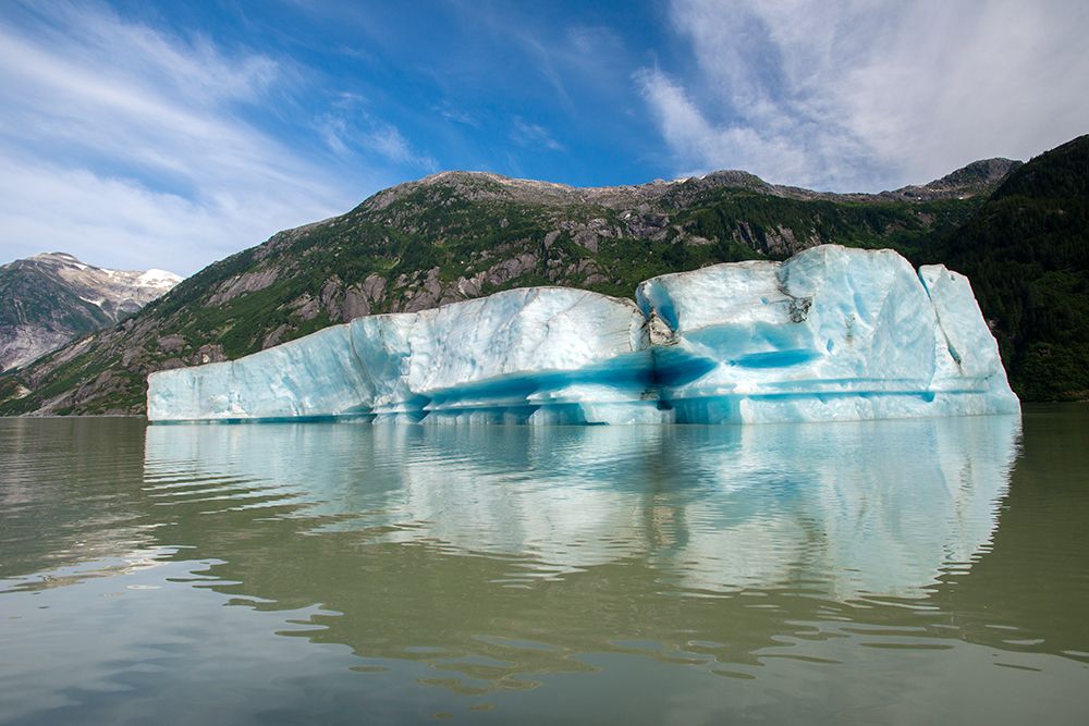 Huge iceberg slowly melts in Shakes Lake. art print by Betty Sederquist for $57.95 CAD