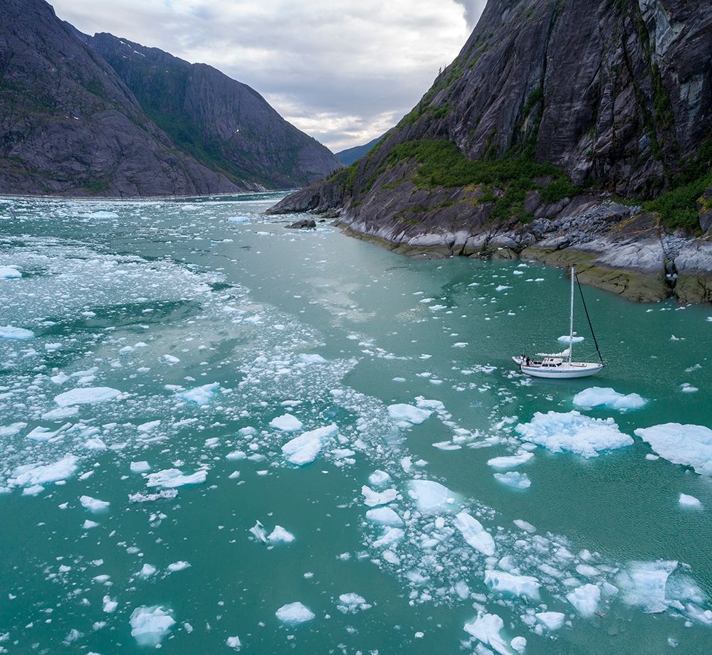 Alaska-Aerial view S/V Abuelos motoring among icebergs floating near calving face of LeConte Glacier art print by Paul Souders for $57.95 CAD