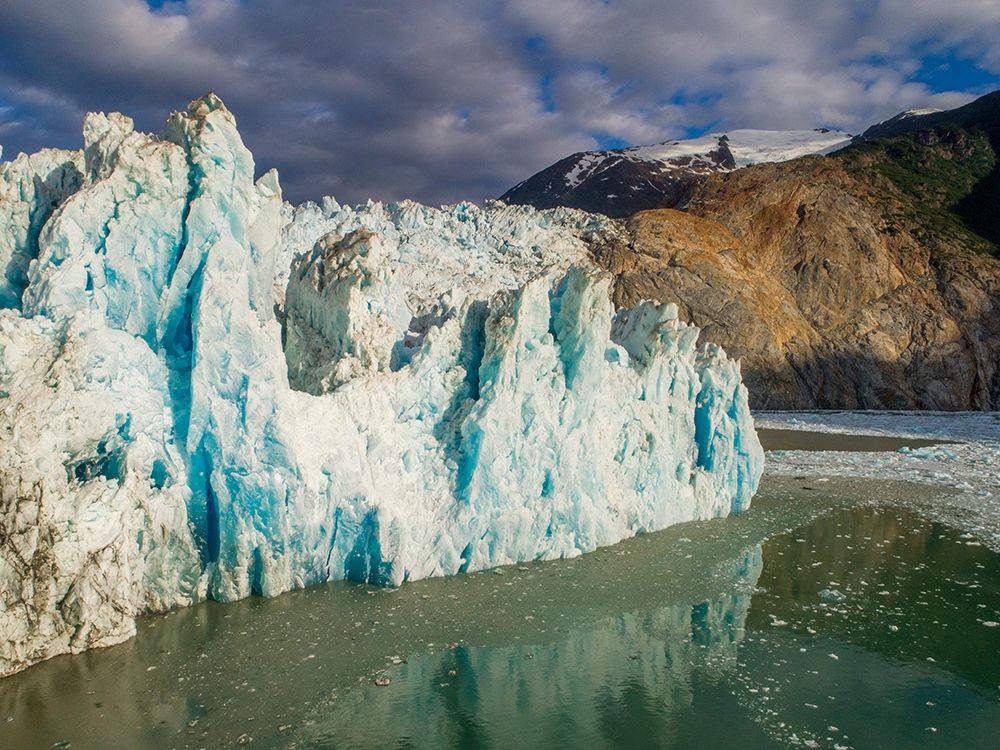 Alaska-Tracy Arm-Fords Terror Wilderness-Aerial view of crevassed blue face of Dawes Glacier art print by Paul Souders for $57.95 CAD