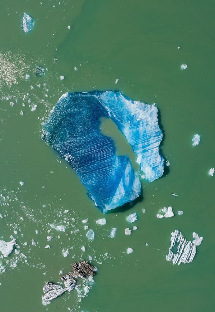 Alaska-Tracy Arm-Aerial view of floating iceberg calved from South Sawyer Glacier in Tracy Arm art print by Paul Souders for $57.95 CAD