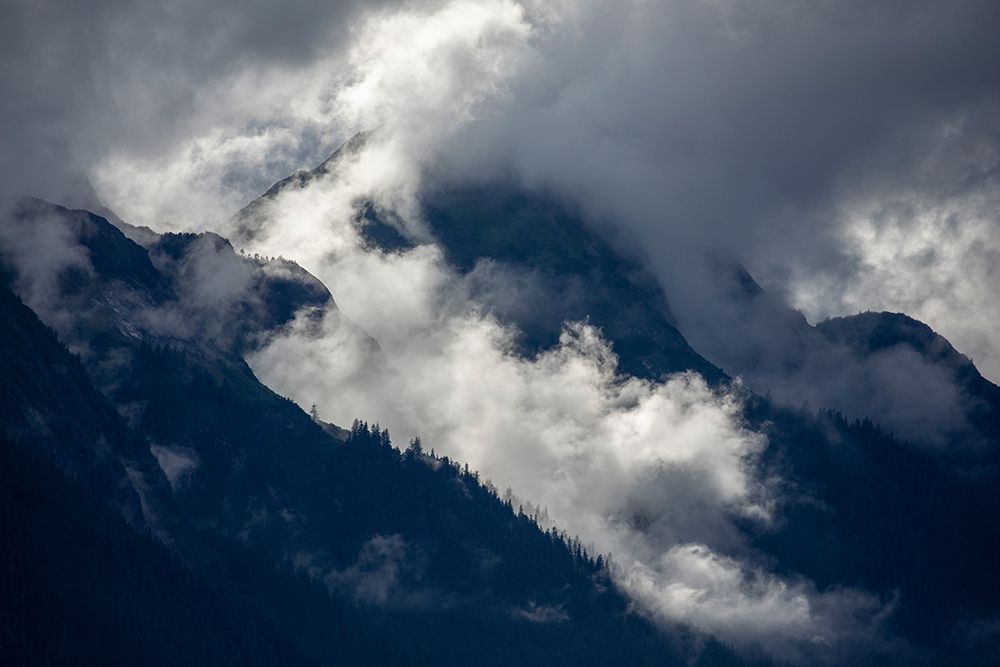 Alaska-Tracy Arm-Fords Terror Wilderness-Morning sun lights mist swirling in mountains art print by Paul Souders for $57.95 CAD