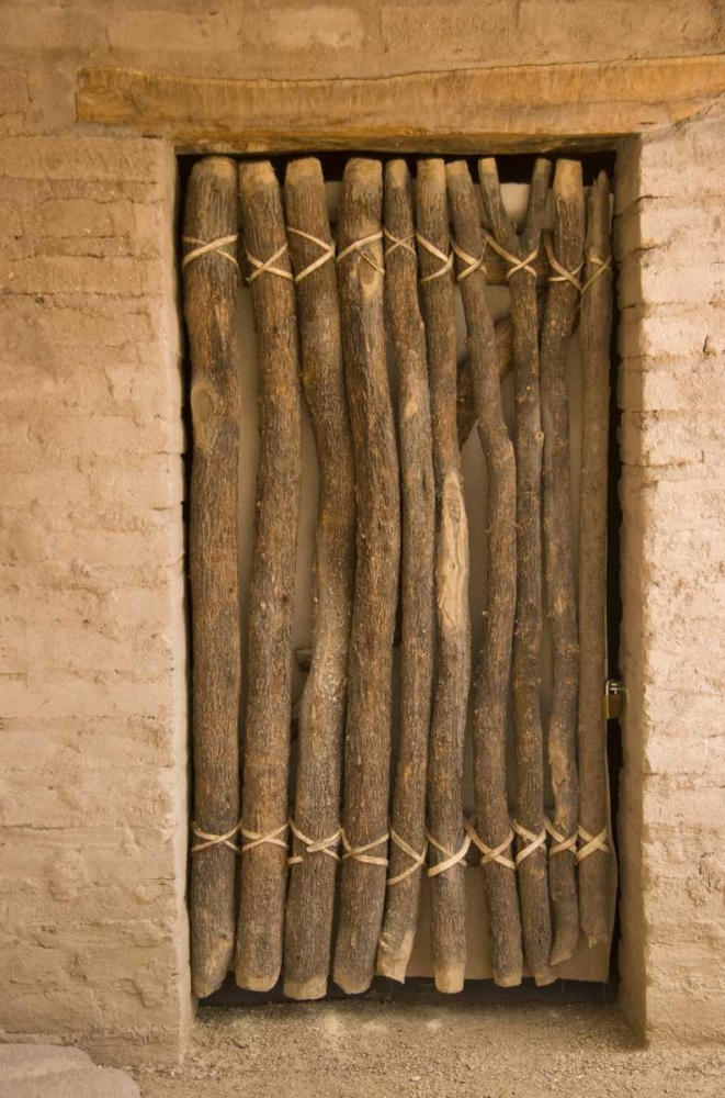 AZ, Tucson Door made of poles in an adobe wall art print by Nancy, Steve Ross for $57.95 CAD