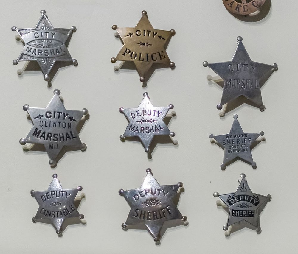 Arizona-Scottsdale Close-up of law enforcement badges from wild west art print by Jaynes Gallery for $57.95 CAD