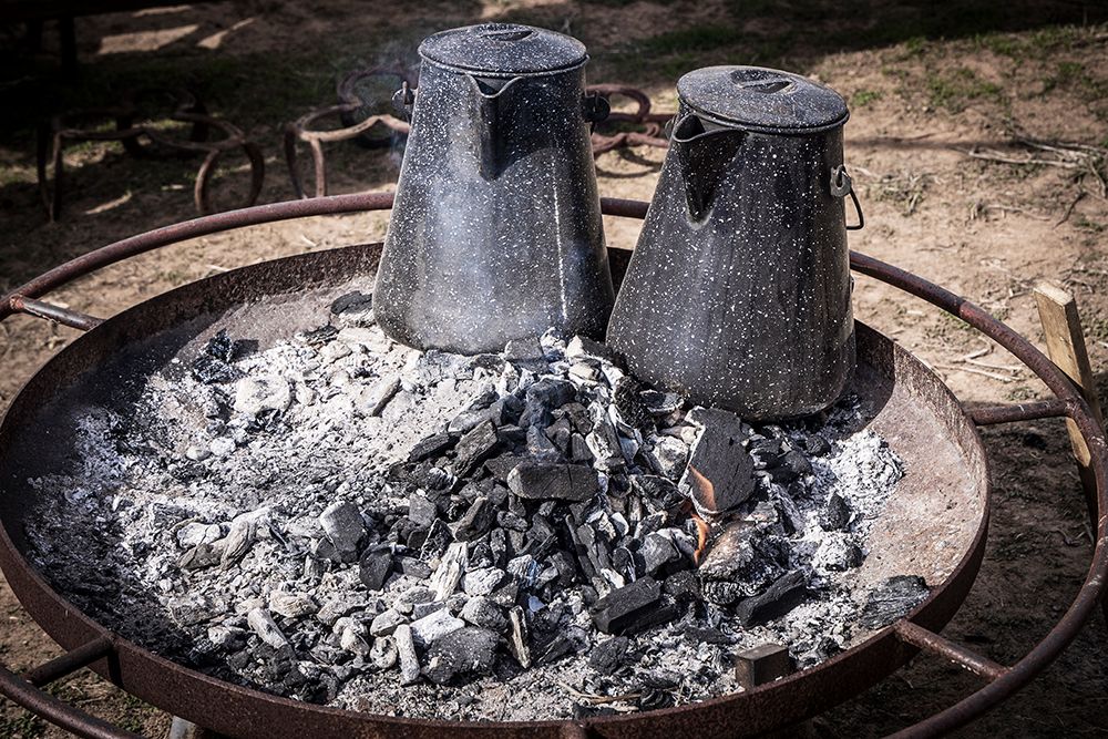 Still-life of two coffee pots keeping warm in the ashes of a fire. art print by Emily M. Wilson for $57.95 CAD