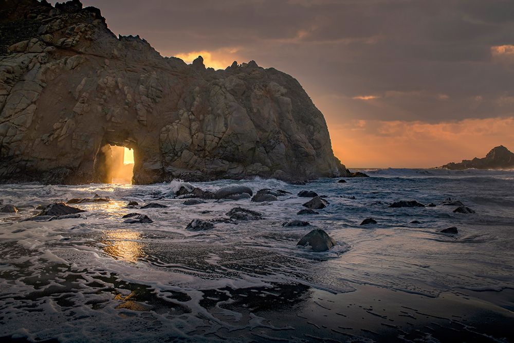 Usa-California Sunsets gleams through this hole in the rock along the Big Sur coast art print by Betty Sederquist for $57.95 CAD