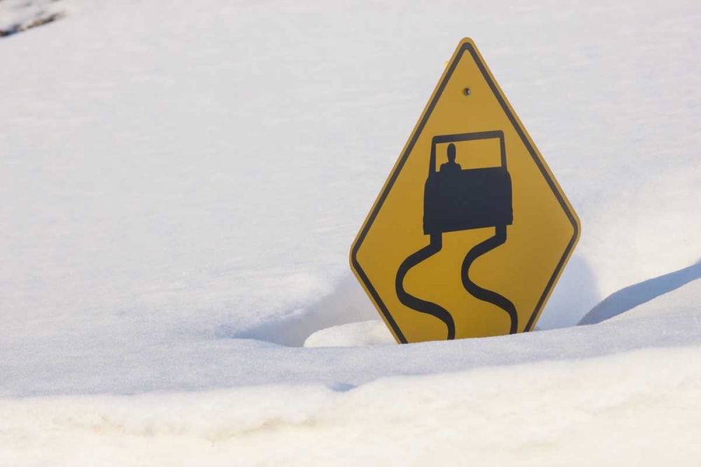 Colorado A slippery when wet sign buried in snow art print by Don Grall for $57.95 CAD