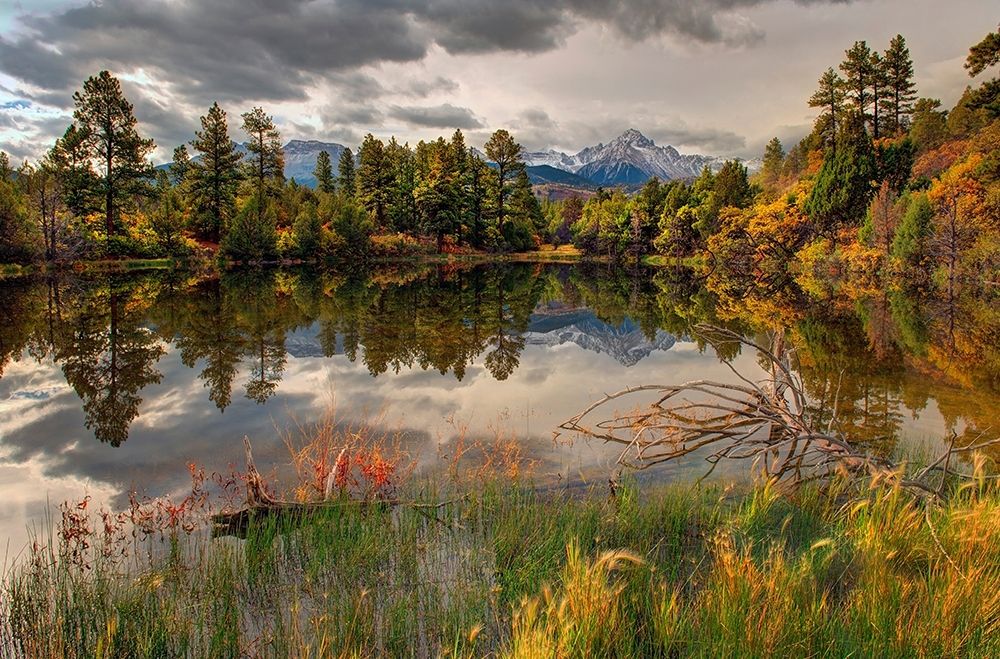 A tranquil pond reflects Mt Snaffles and Fall in the Colorado Rocky Mountains art print by Steve Mohlenkamp for $57.95 CAD
