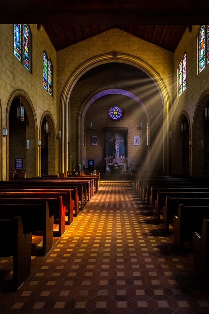 Golden light of sunrays coming into the stained glass windows of St Leos Abbey in Florida art print by Sheila Haddad for $57.95 CAD