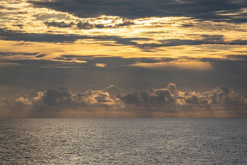 Dramatic skies-rain-sunbeams-sunset colors kiss the horizon of the Gulf of Mexico-Florida art print by Sheila Haddad for $57.95 CAD