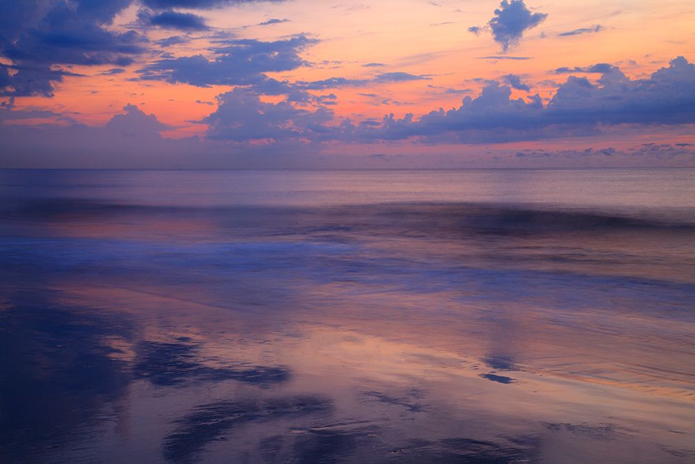 USA- Georgia- Tybee Island. Sunrise with clouds and reflections along the coast. art print by Joanne Wells for $57.95 CAD