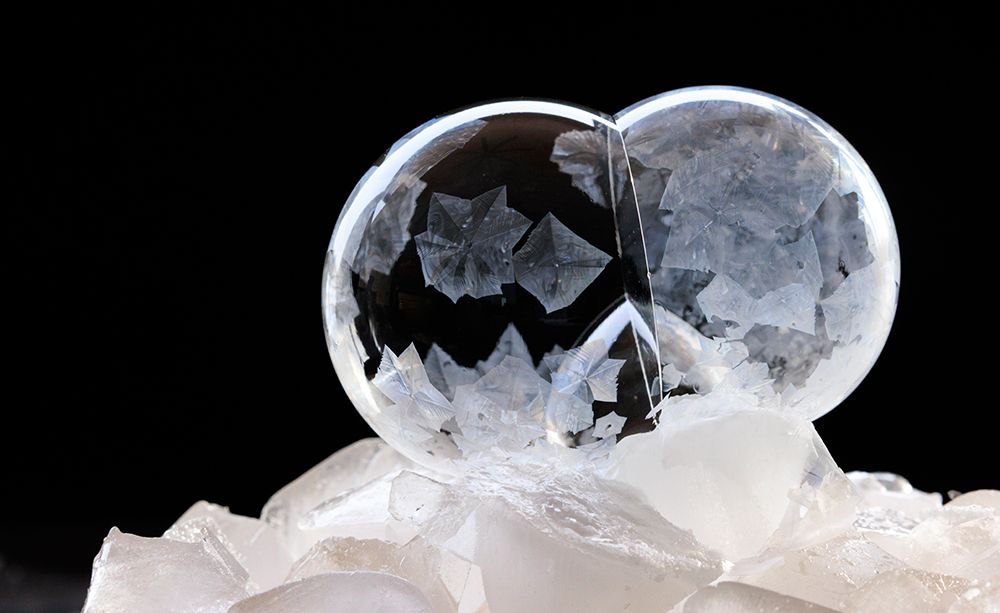 USA, Indiana, Carmel. Frozen soap bubbles with feather-like crystals on bed of ice. art print by Jaynes Gallery for $57.95 CAD