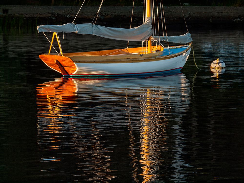 USA, Massachusetts, Cape Cod, Falmouth. Vintage sailboat moored in Quissett Harbor at sunset art print by Ann Collins for $57.95 CAD