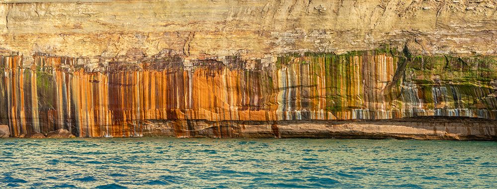 USA, Michigan, Pictured Rocks National Lakeshore. Mineral stains on sandstone cliffs. art print by Jaynes Gallery for $57.95 CAD