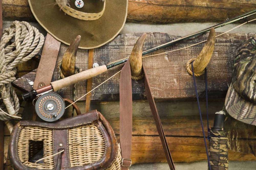 MT, Fishing ger and hat hang on horn pegs art print by Don Paulson for $57.95 CAD