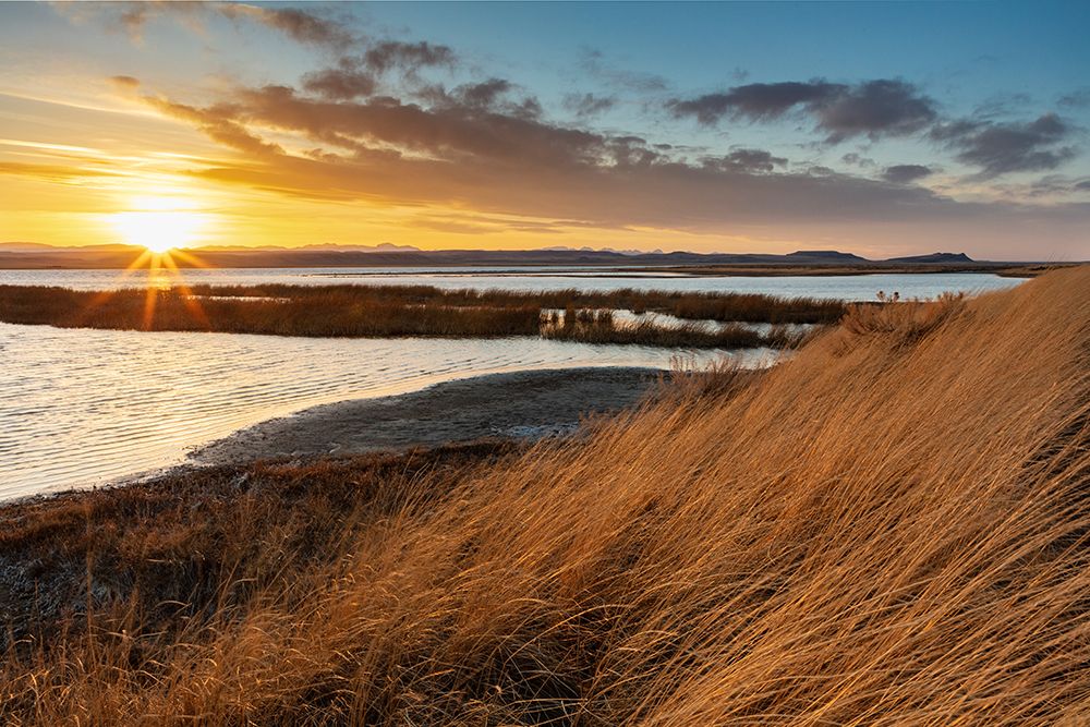 Sunset skies at Freezeout Lake Wildlife Management Area near Choteau-Montana-USA art print by Chuck Haney for $57.95 CAD