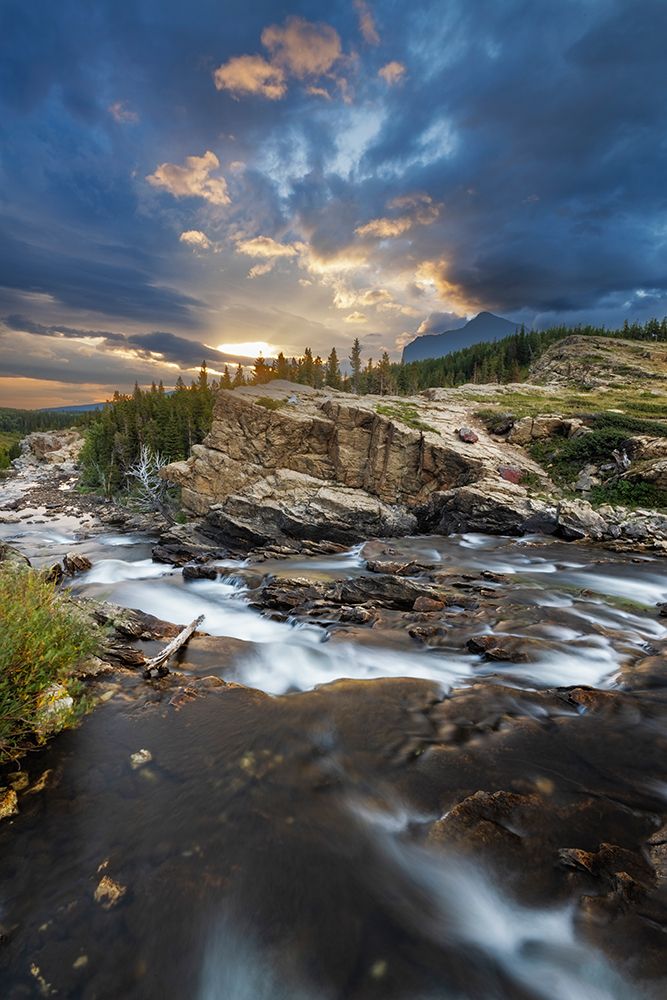Swiftcurrent Falls at sunrise in Glacier National Park-Montana-USA art print by Chuck Haney for $57.95 CAD