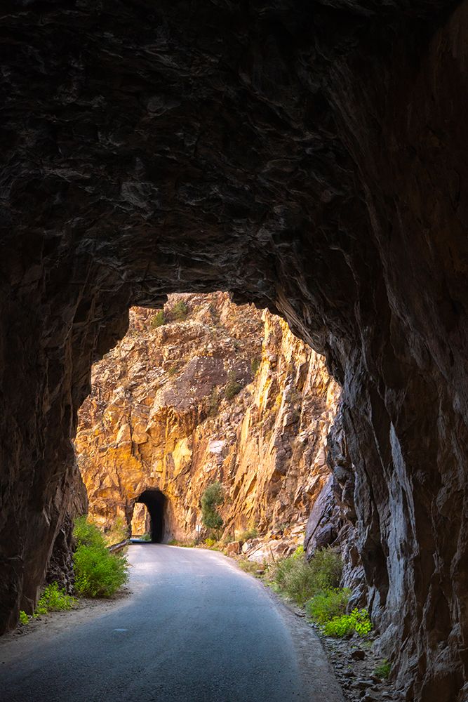 USA, New Mexico, Jemez National Recreation Area. Gilman tunnels cut through cliffs. art print by Jaynes Gallery for $57.95 CAD