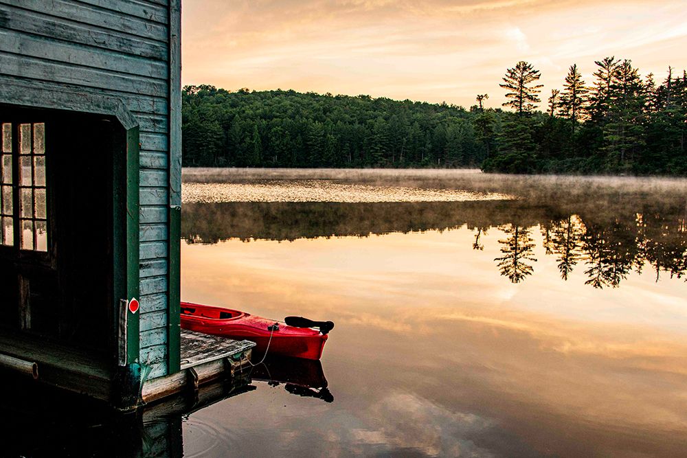 USA, New York. Adirondack Park, Saranac Lake, Hoel Pond, canoe at boathouse dock. art print by Alison Jones for $57.95 CAD