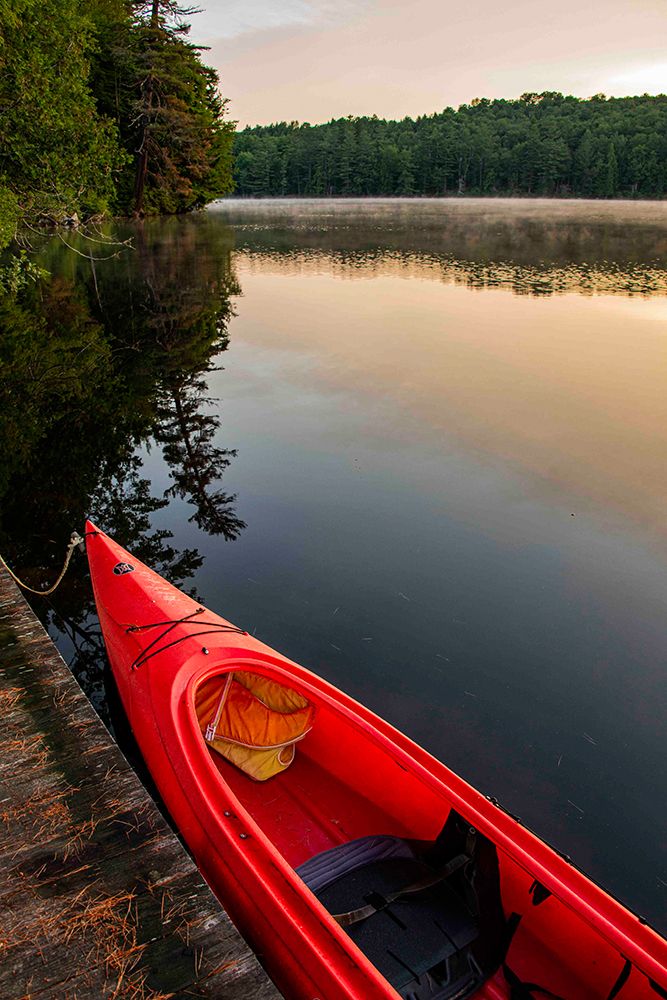 USA, New York. Adirondack Park, Saranac Lake, Hoel Pond, canoe at boathouse dock. art print by Alison Jones for $57.95 CAD