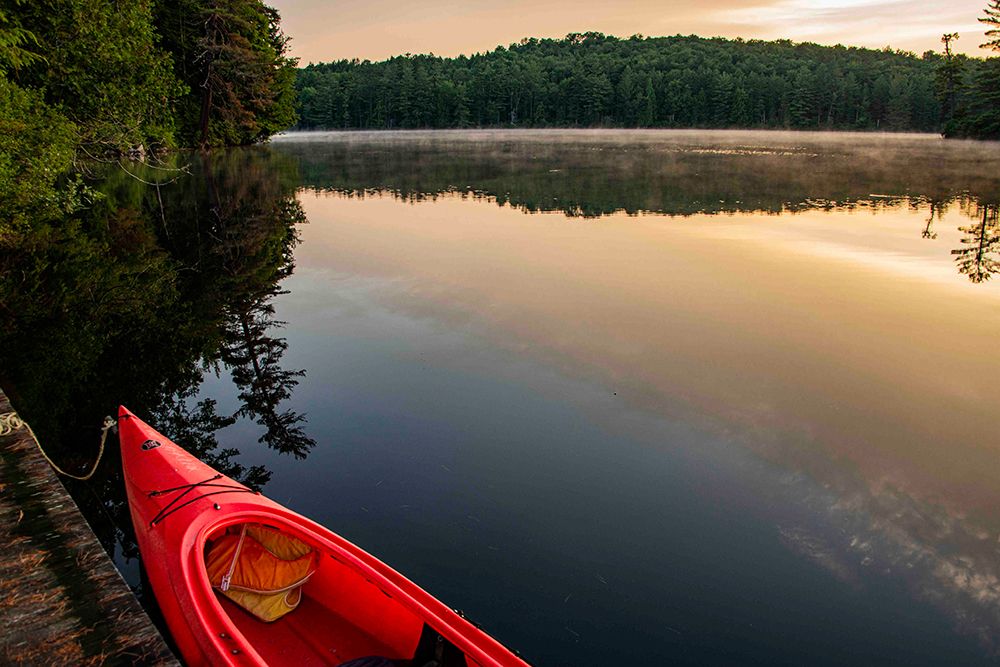 USA, New York. Adirondack Park, Saranac Lake, Hoel Pond, canoe at boathouse dock. art print by Alison Jones for $57.95 CAD