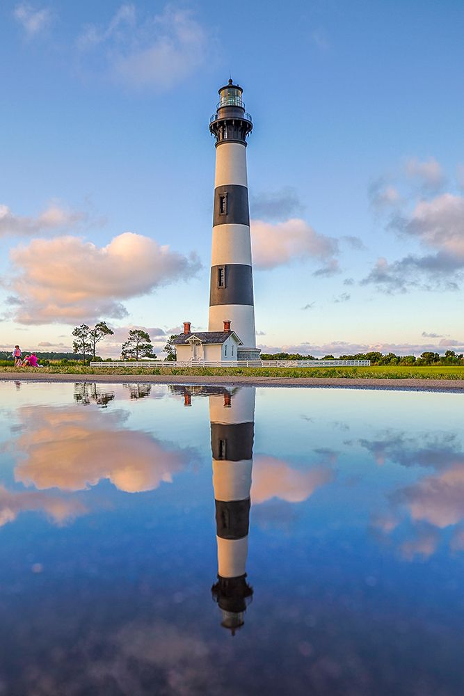 USA-North Carolina-Nags Head Bodie Island Lighthouse reflection in a puddle art print by Hollice Looney for $57.95 CAD