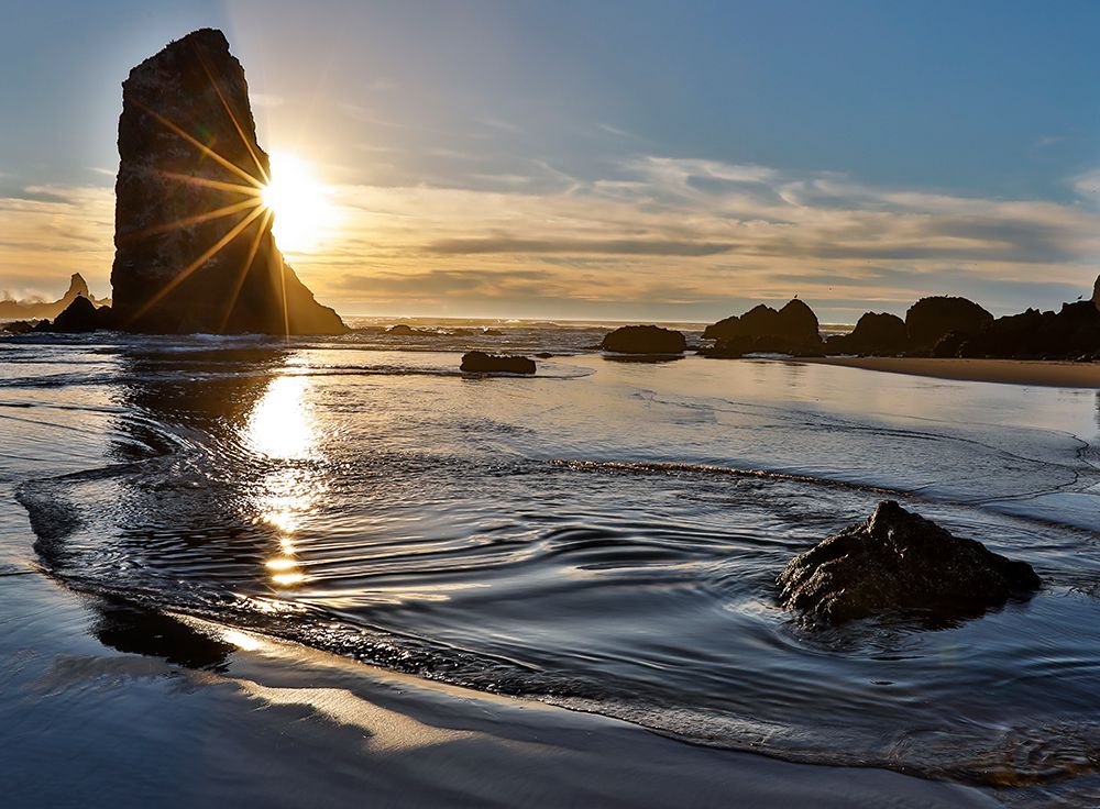 USA- Oregon. Cannon Beach low tide and ripples in the sand and sea stacks at sunset. art print by Darrell Gulin for $57.95 CAD