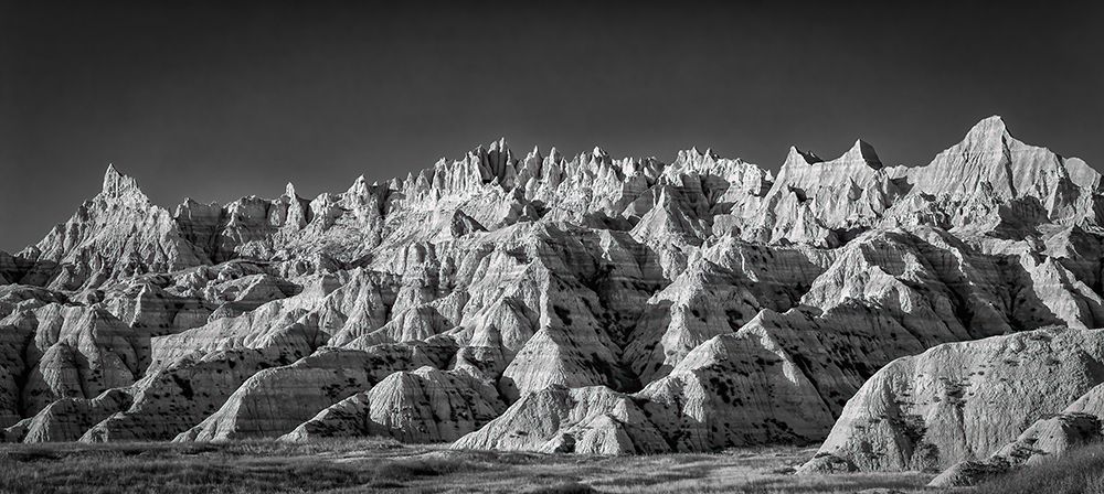 The wind and water eroded landscape in the Badlands National Park make beautiful natural carvings. art print by Larry Richardson for $57.95 CAD