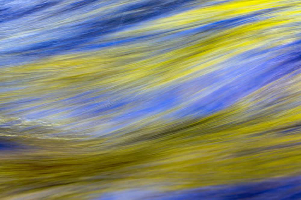 Spring foliage colors and sky reflecting on ripples on stream, Great Smoky Mountains NP, Tennessee art print by Adam Jones for $57.95 CAD