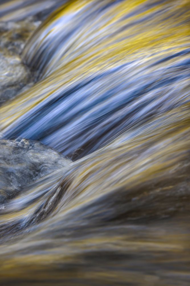 Spring foliage colors and sky reflecting on ripples on stream, Great Smoky Mountains NP, Tennessee art print by Adam Jones for $57.95 CAD