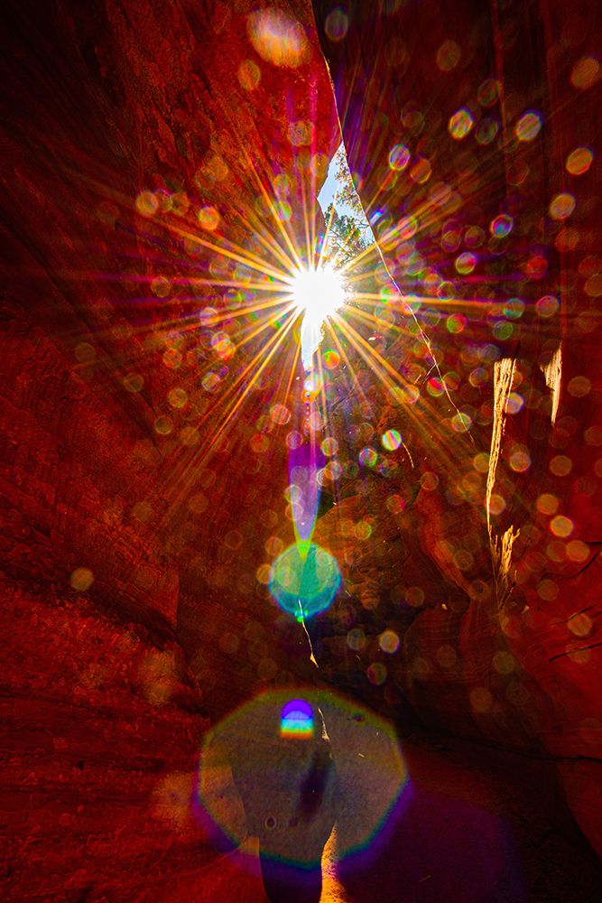 USA, Utah, Kanab, Peekaboo Slot Canyon, Sun Star Reflections art print by Bernard Friel for $57.95 CAD