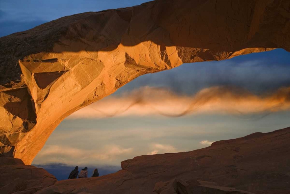 UT, Arches NP Hikers at Skyline arch at sunset art print by Don Paulson for $57.95 CAD