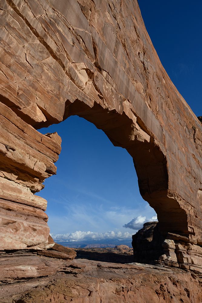 USA-Utah. Jeep Arch and clouds near Moab art print by Howie Garber for $57.95 CAD