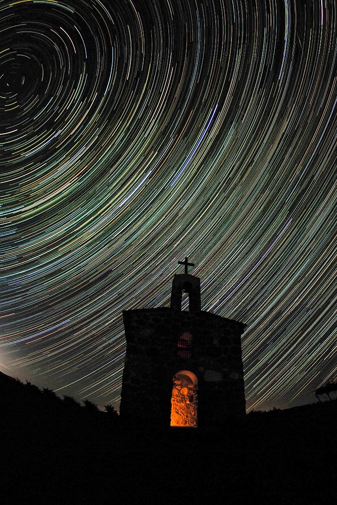 Star trail over the stone chapel at Red Willow Vineyard (PR) art print by Julie Eggers for $57.95 CAD