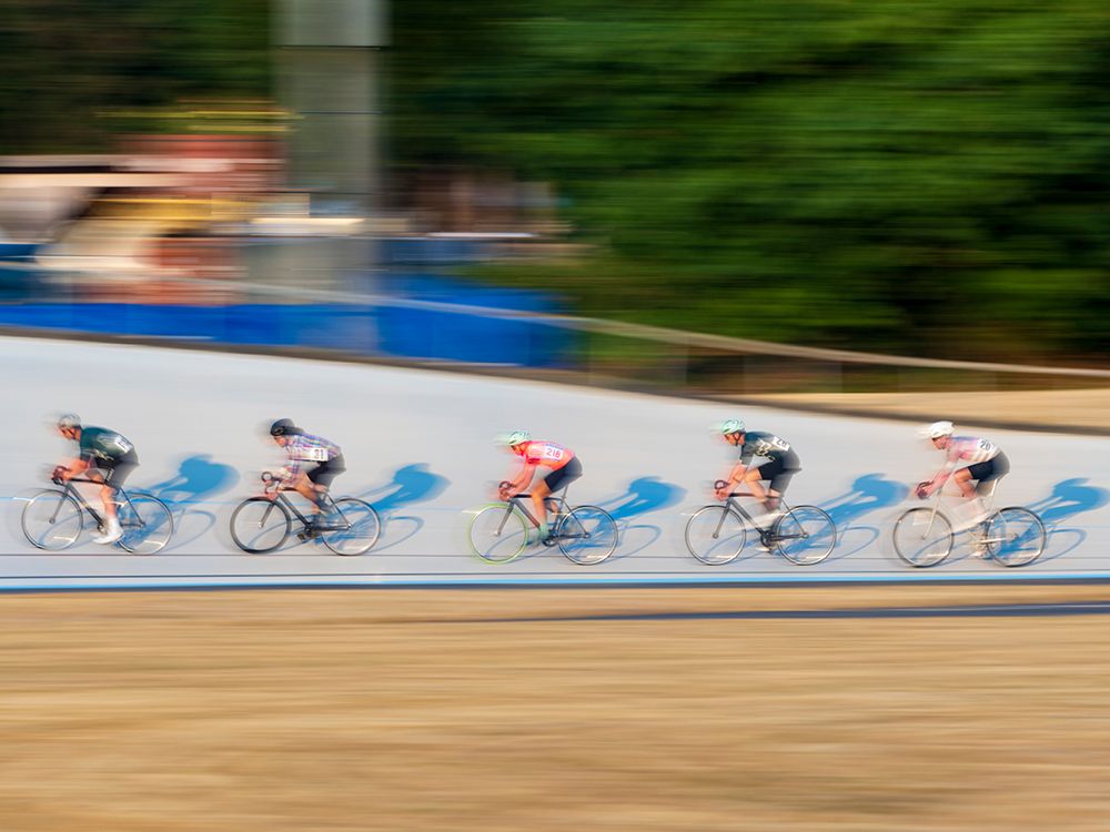 Bicyclists racing in the Jerry Baker Memorial Velodrome, Redmond, Washington State. art print by Merrill Images for $57.95 CAD
