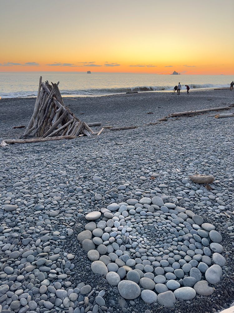 Rialto Beach, Olympic Peninsula, Washington. Pebbles arranged in a circle on the beach. Sunset. art print by Merrill Images for $57.95 CAD