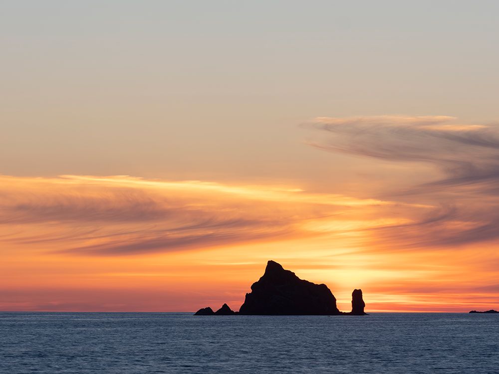 Rialto Beach, Olympic Peninsula, Washington State. Seastack silhouetted at sunset. art print by Merrill Images for $57.95 CAD