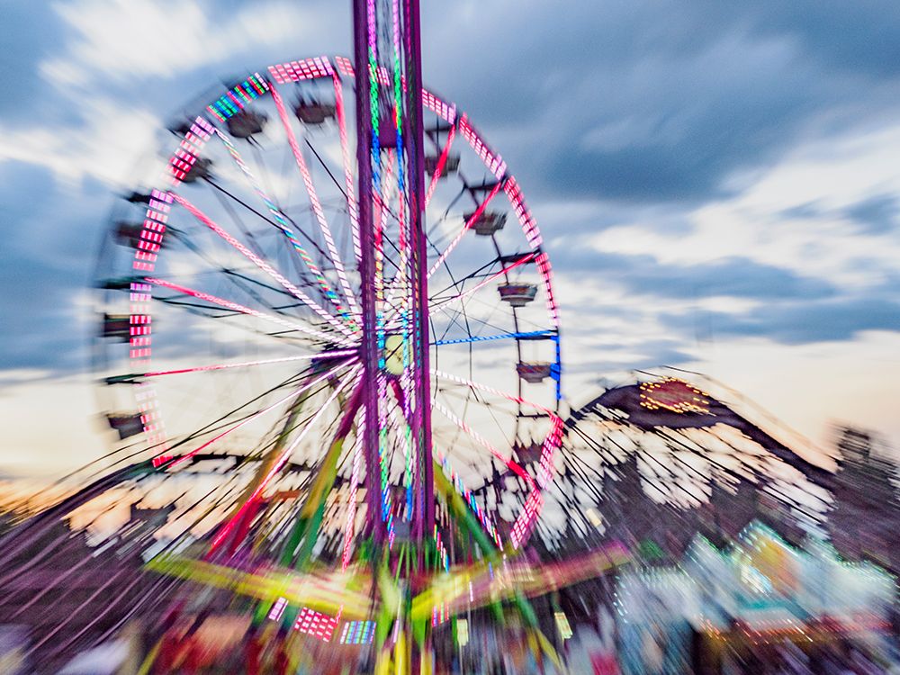 Motion blur of rides at Washington State Fair at Puyallup. art print by Merrill Images for $57.95 CAD