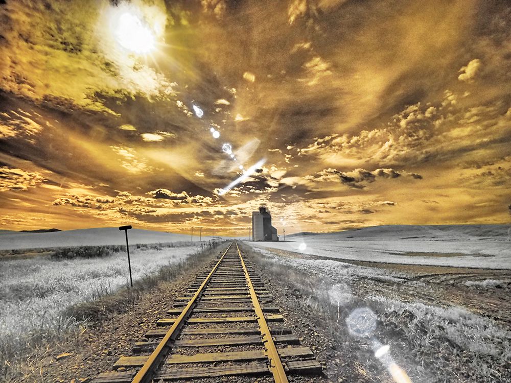 USA-Washington State-Palouse-Backcountry rail Road and Silo through wheat field with clouds art print by Terry Eggers for $57.95 CAD