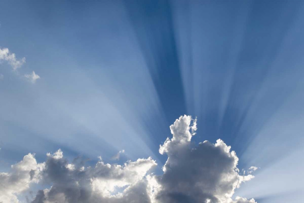 Crepuscular or Gods rays streak past cloud art print by Don Paulson for $57.95 CAD