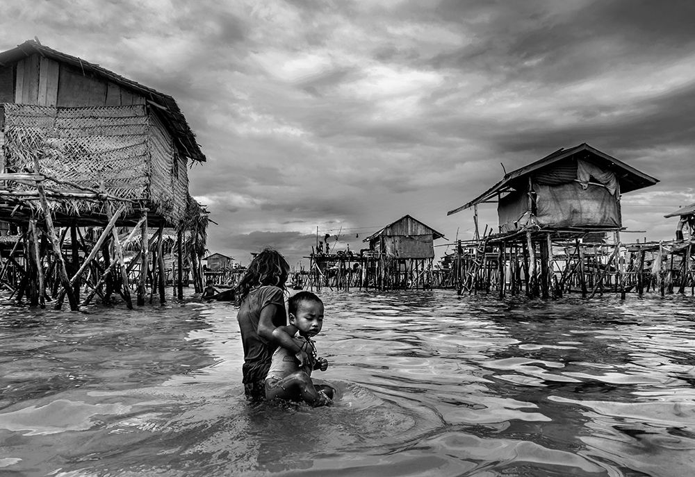 carrying her brother art print by Pradeep Raja for $57.95 CAD