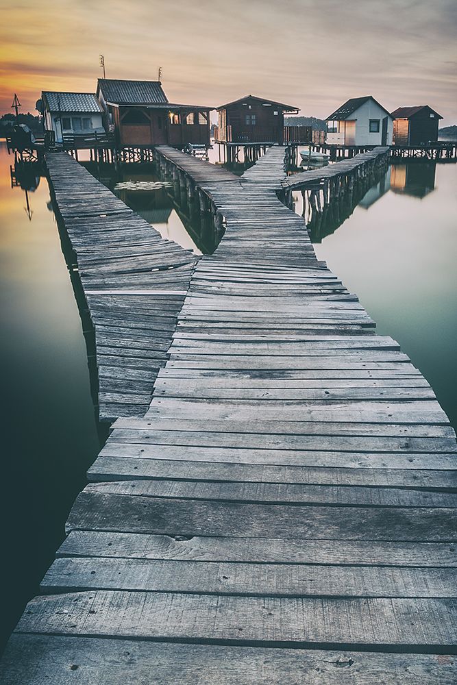 lake and roads and cottages art print by Pavol Stranak for $57.95 CAD