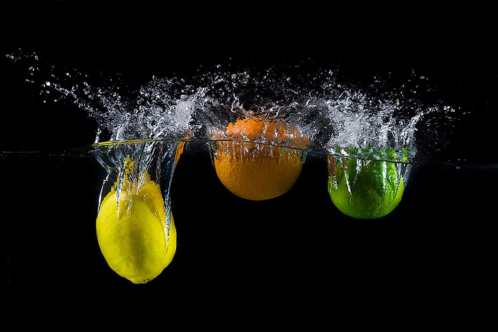 Triple Citrus Splash art print by Mogyorosi Stefan for $57.95 CAD