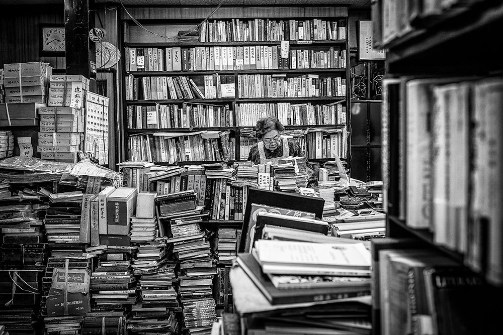 The lady and her shelfs art print by Marco Tagliarino for $57.95 CAD